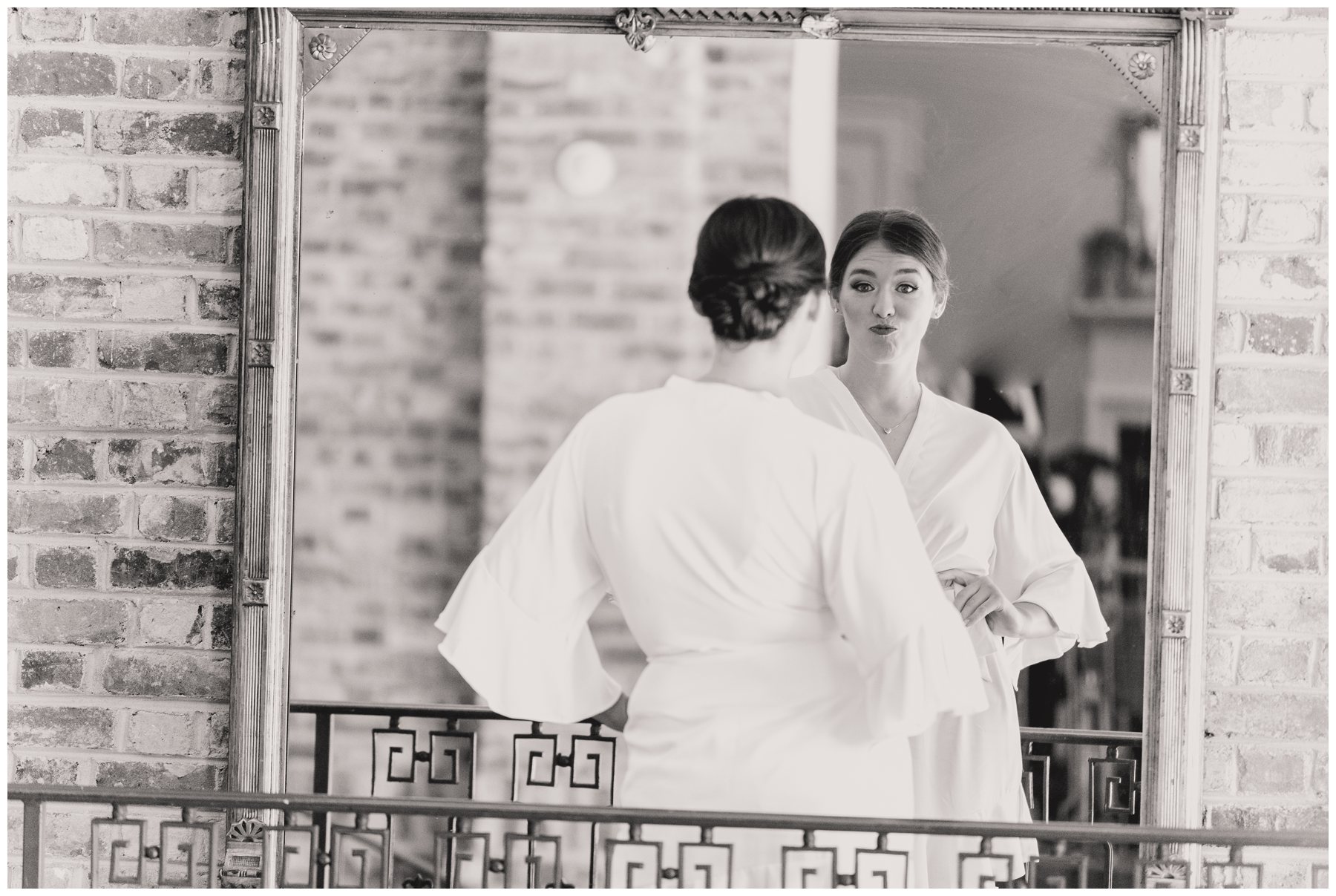 bride admiring herself in a mirror,