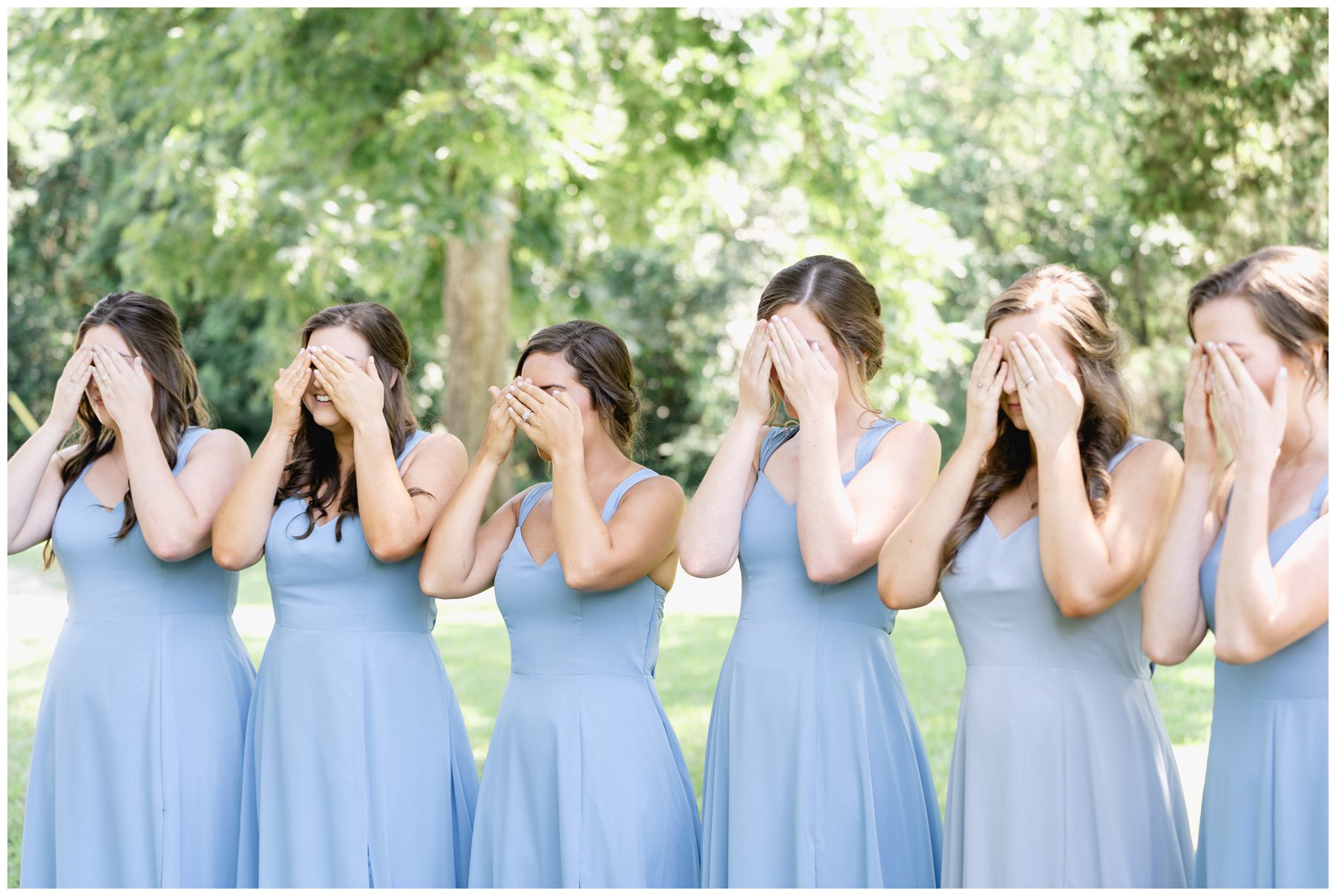 bridesmaids covering their faces before first look,