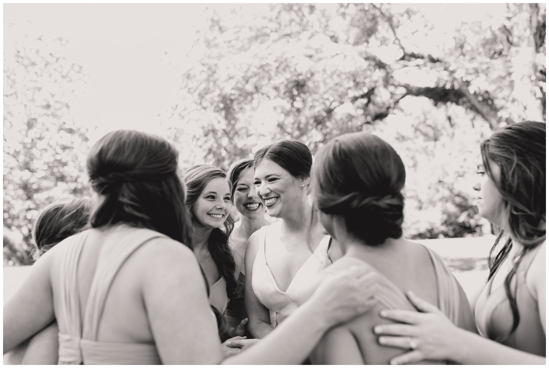 bride smiling with bridesmaids in Lowndesboro AL,