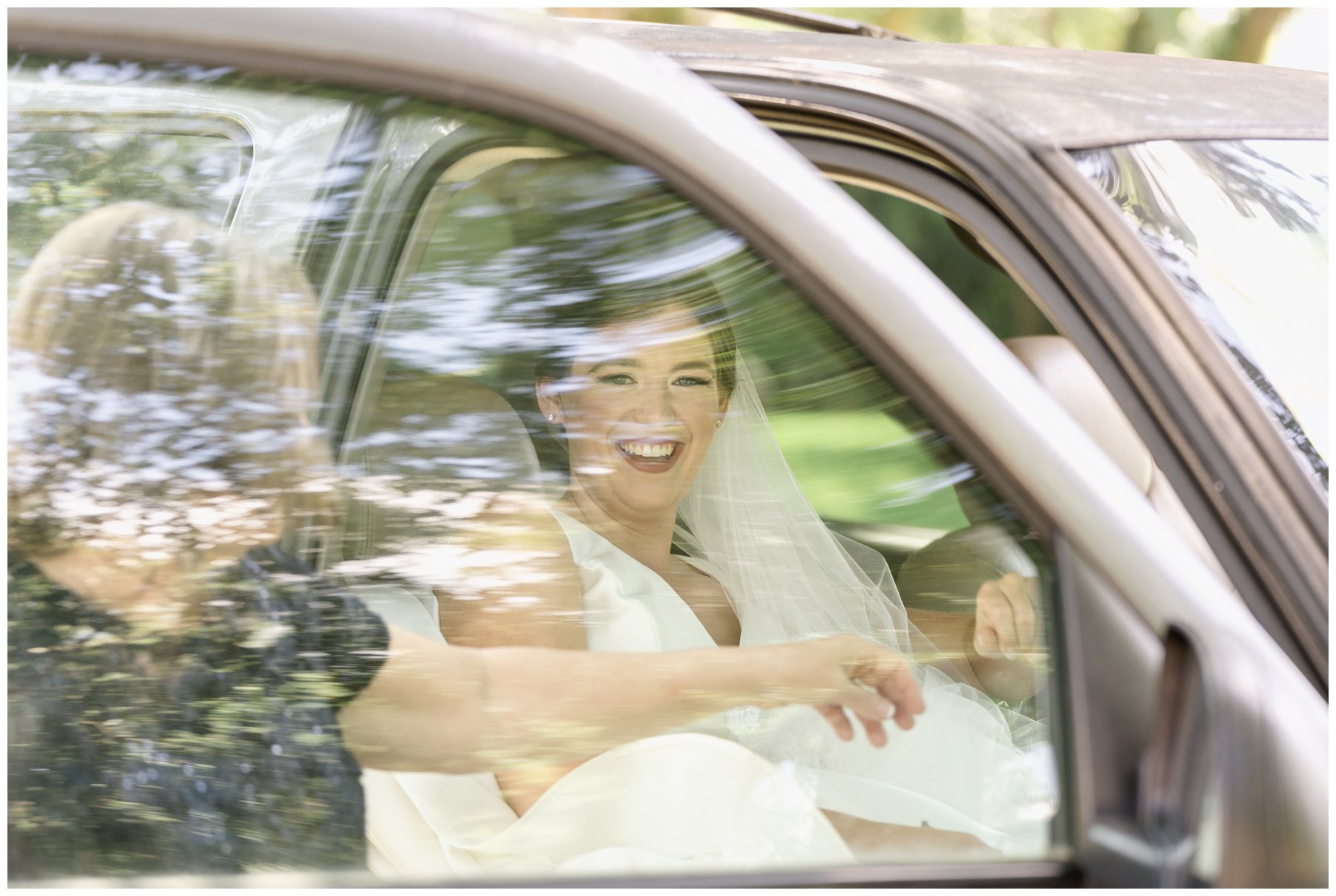 bride getting into car,