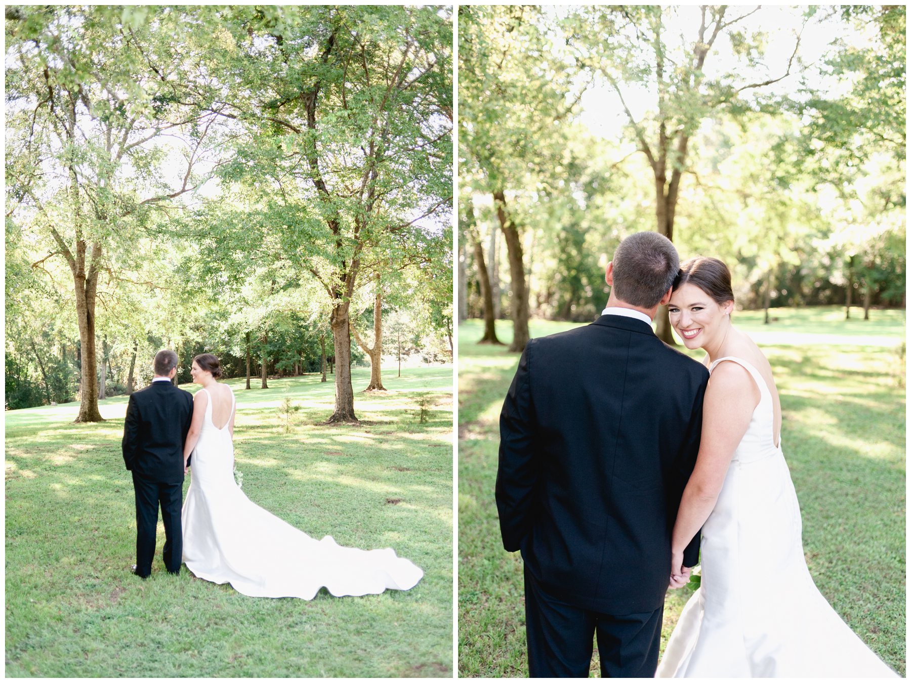 back of bride and groom standing in a field looking at each other,