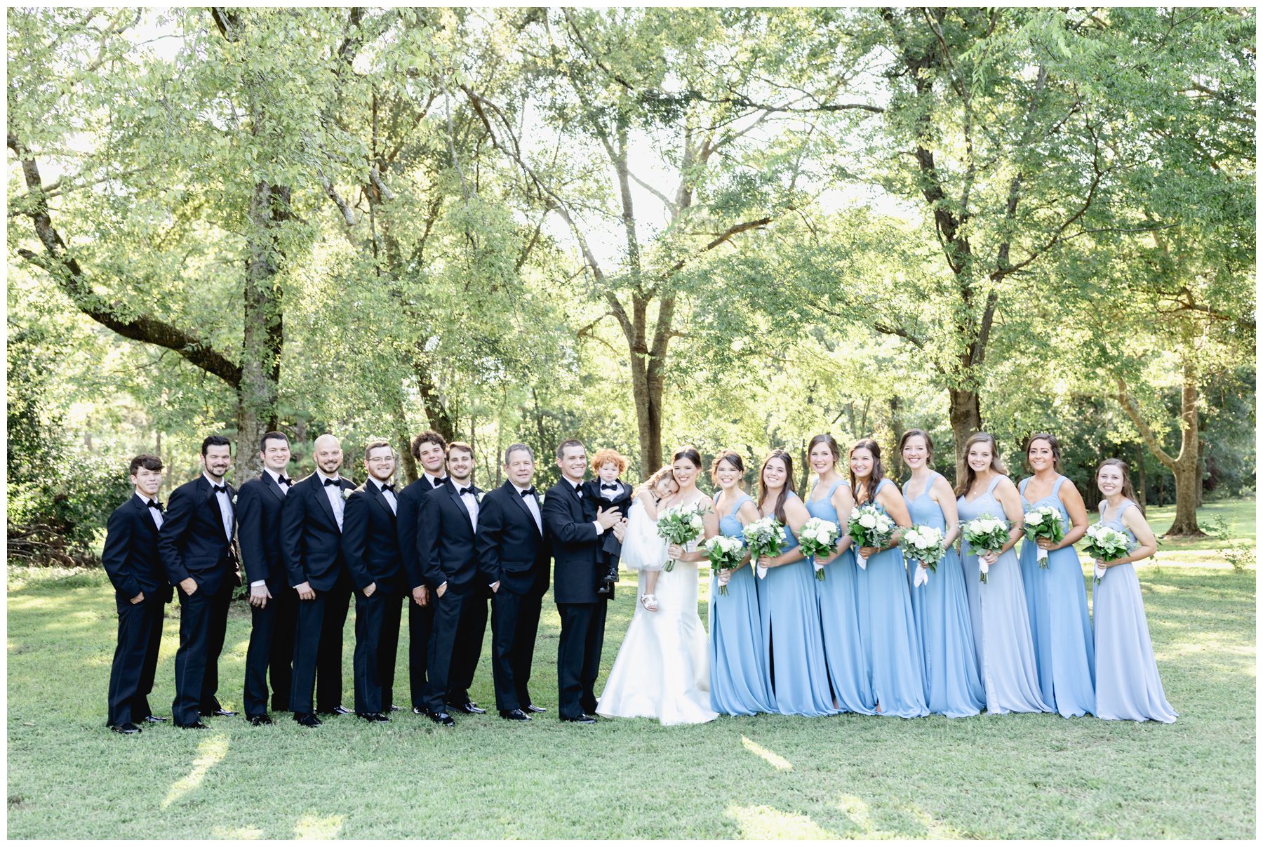 wedding party including ring bearer and flowers girl,