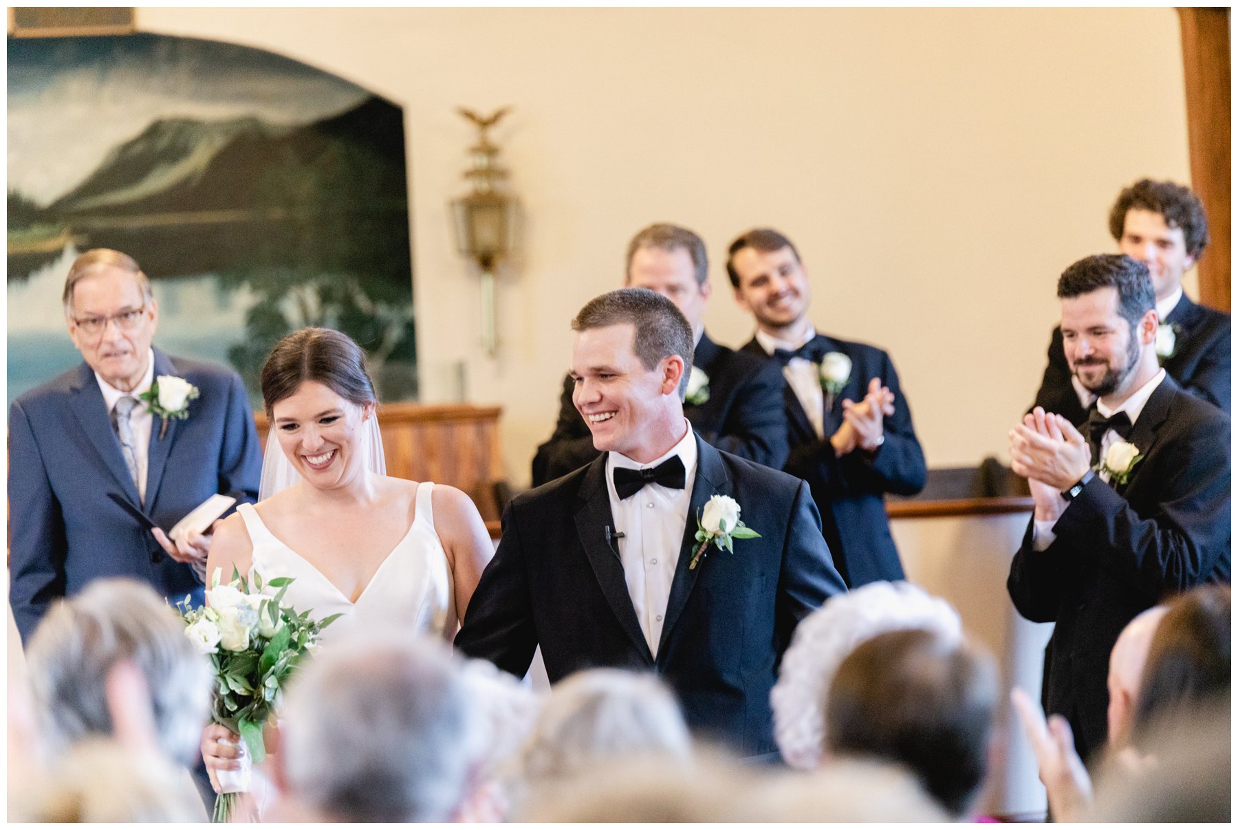 bride and groom smiling after ceremony conclusion,