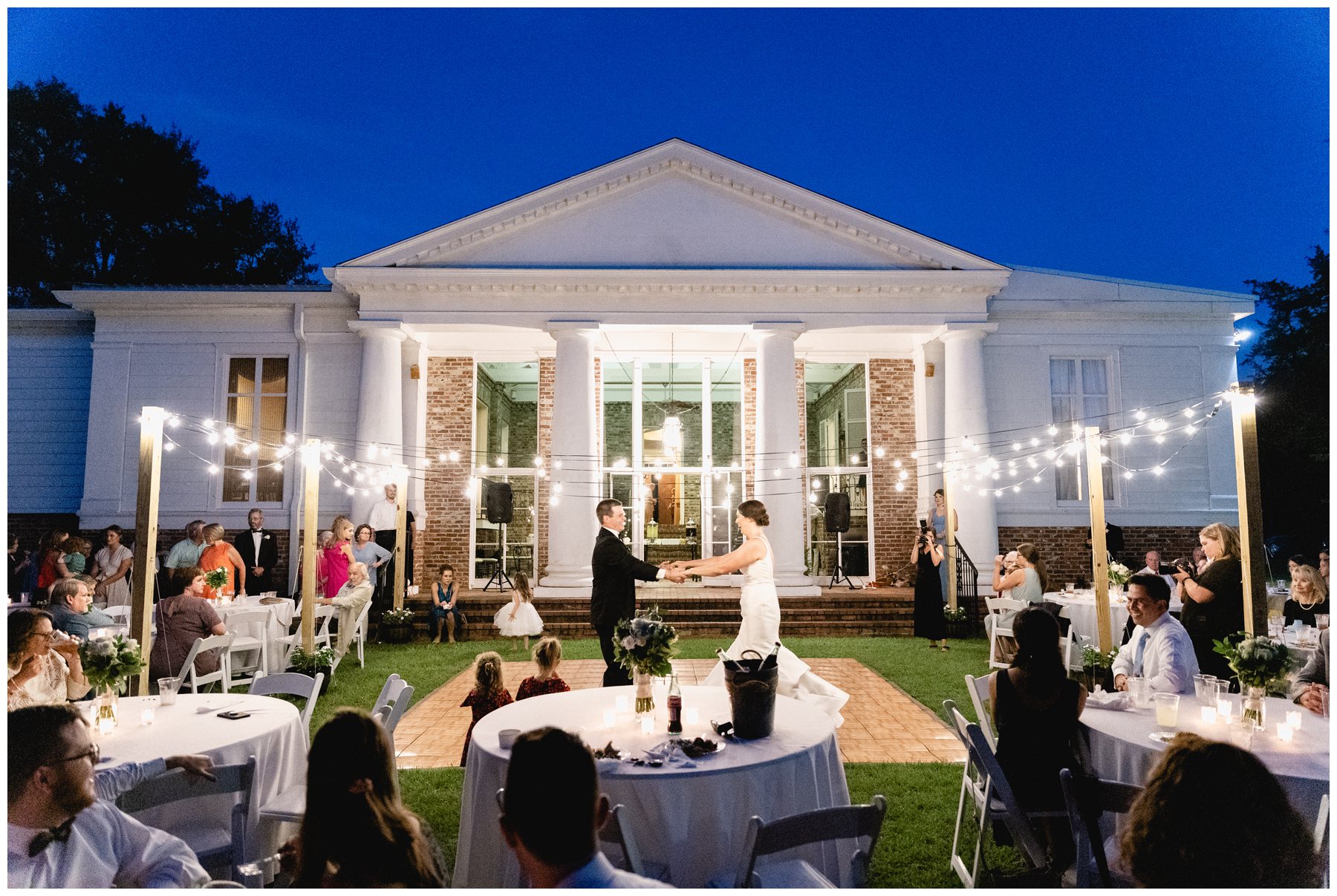 bride and groom first dance at back of Merango House in Lowndesboro AL,