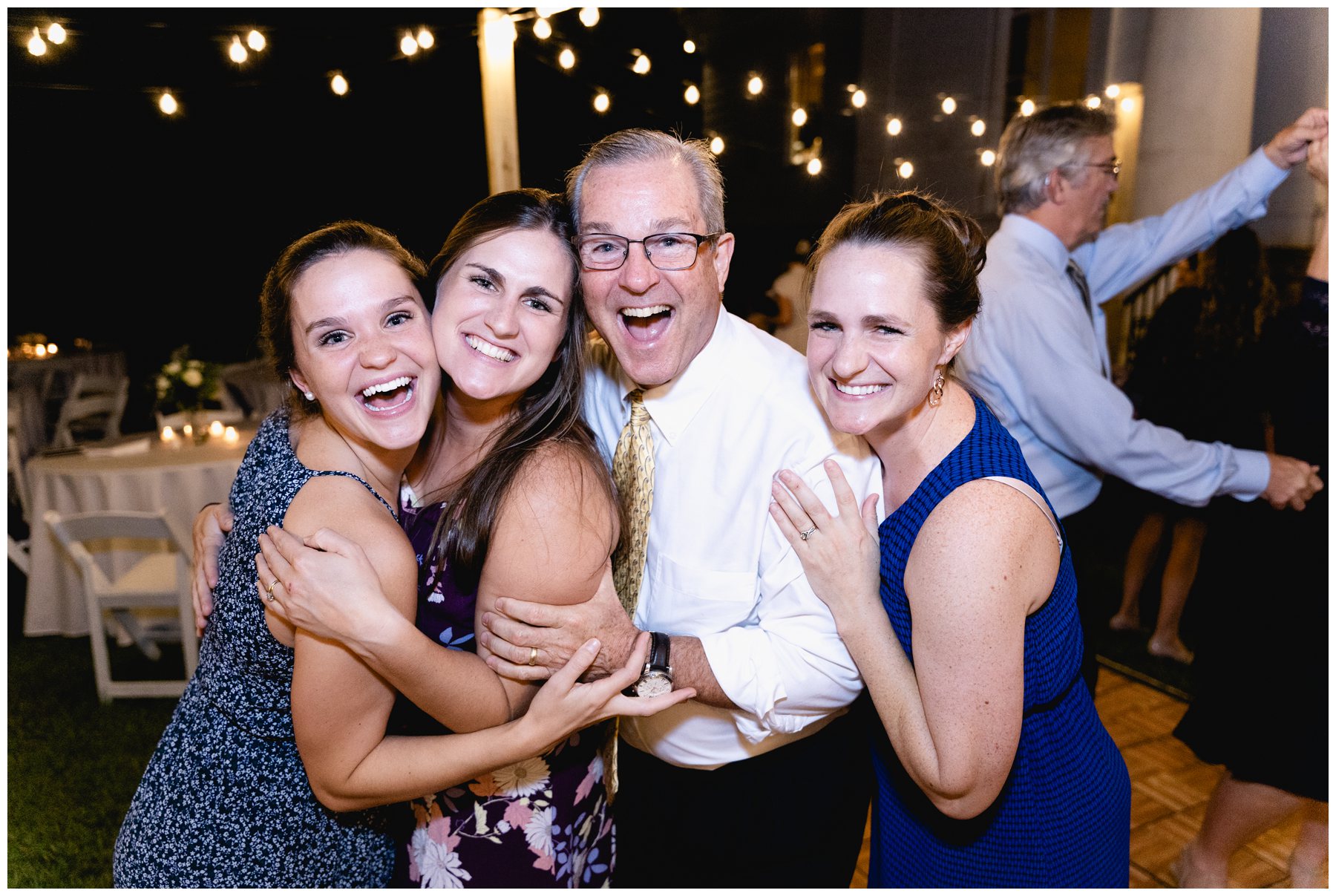 guests smiling on dance floor at Merango House,