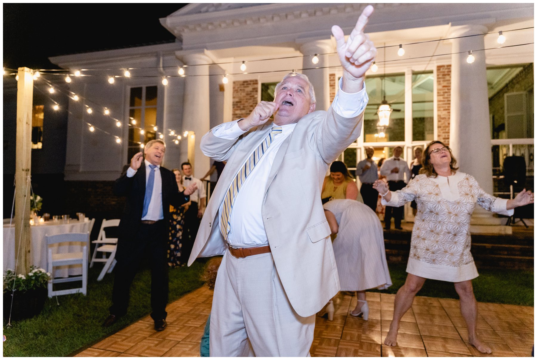 guest singing at wedding reception,