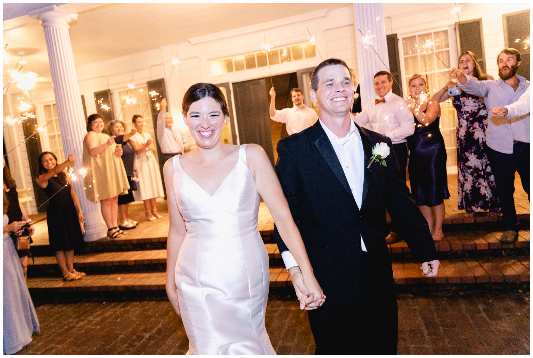 bride and groom sparkler exit at Merango House,